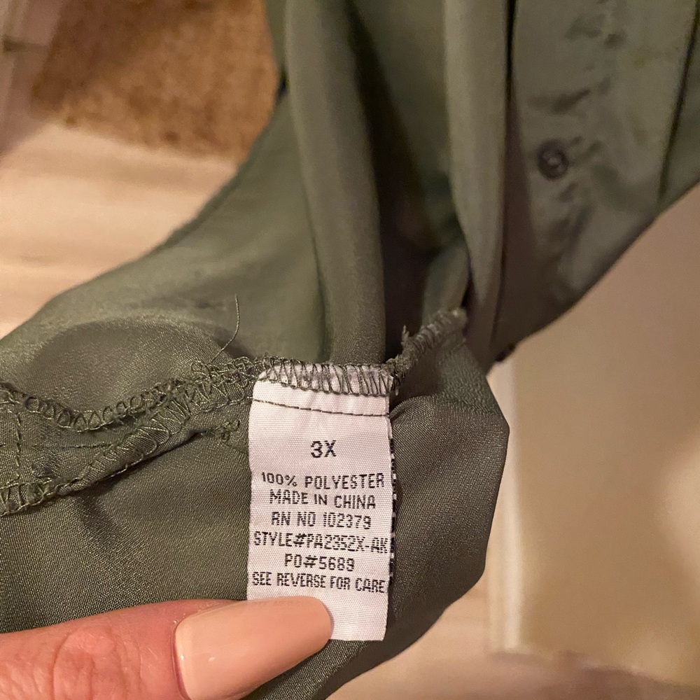 Studded shouldered army green blouse.